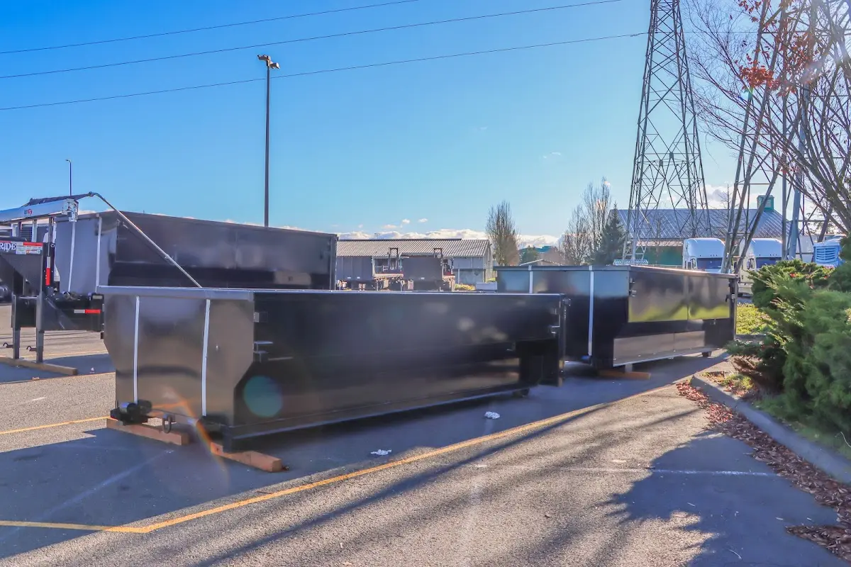 Roll-off dumpster ready for waste disposal at job site for Commercial Dumpster Rental in Zachary